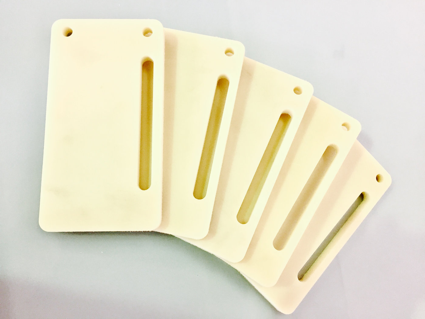 Slotted nylon wear plates