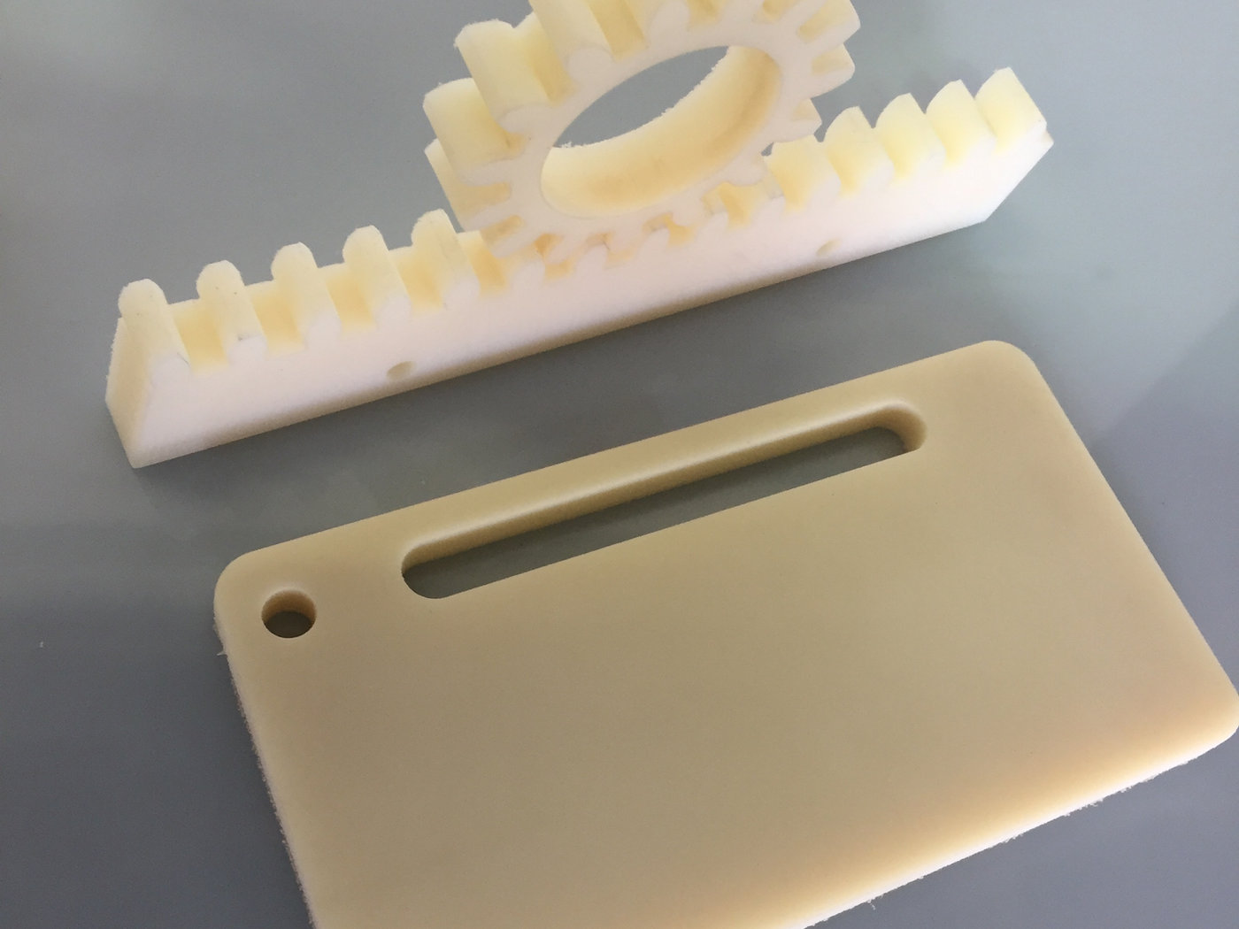 Wear plate with machined nylon rack section